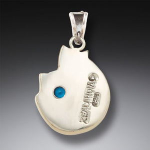 Fossilized mammoth ivory cat pendant with blue topaz - Cozy Cat